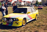 Rafals gelber Sport Evolution mit M-Streifen-Folierung